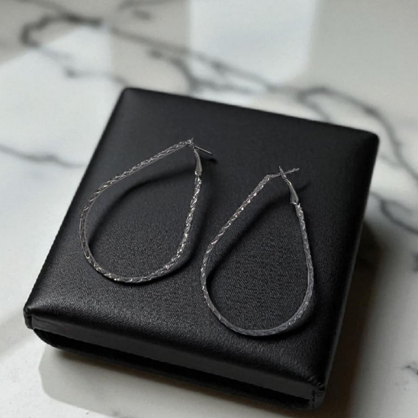 Black Teardrop Studs